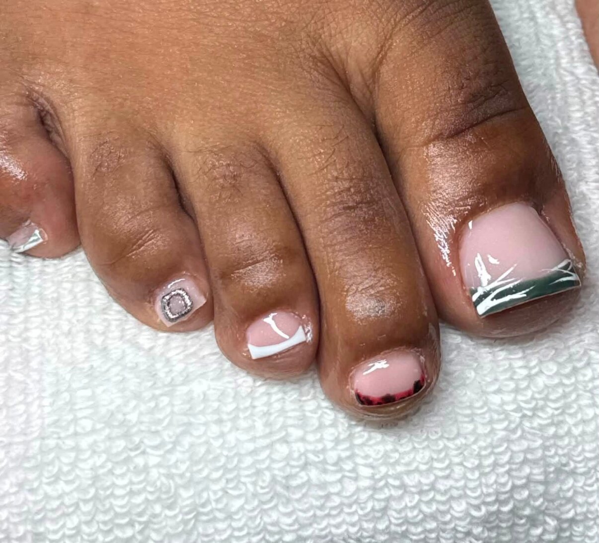 French pedicure with chrome tip accent